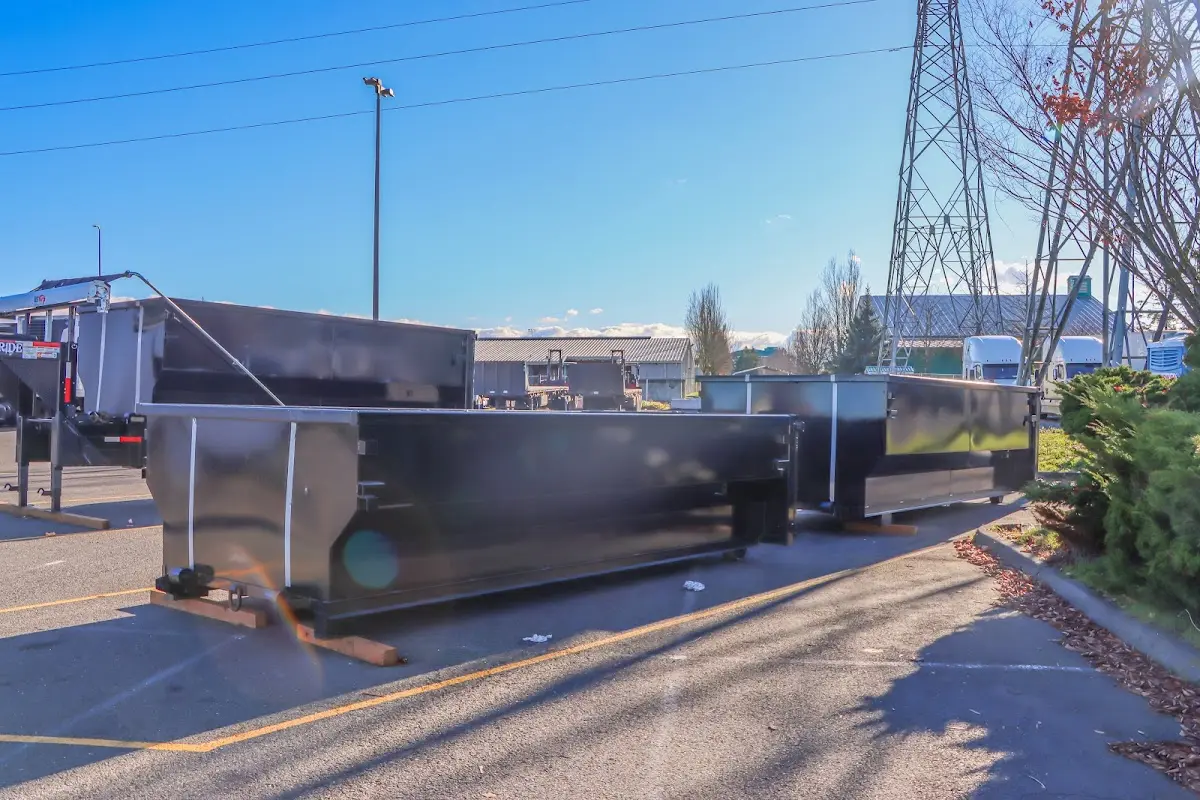 Roll-off dumpster ready for waste disposal at job site for Roll Off Dumpster Rental in Sabattus